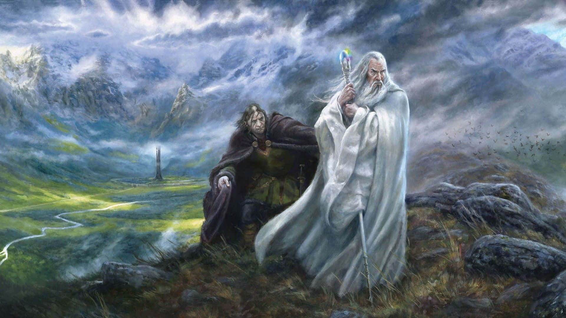Lotr 桌布 壁紙 — 兩個奇幻人物站在霧氣瀰漫的山脊上，俯瞰著一個山谷，遠處有一座塔樓，天空風雨交加。