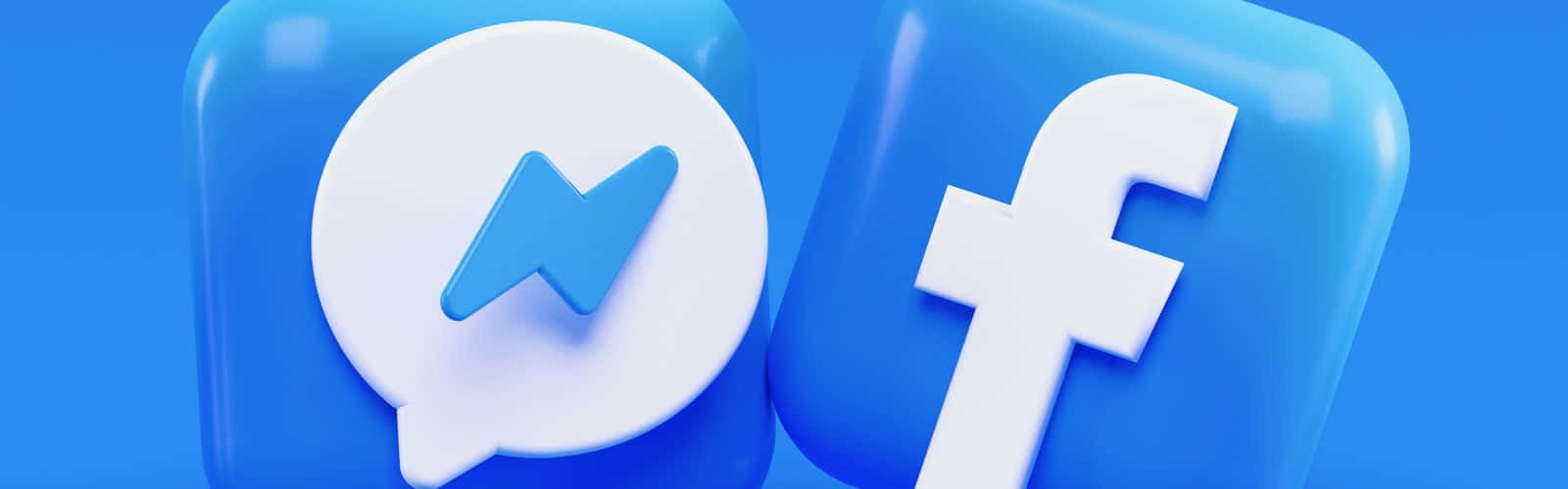 Facebook 桌布 壁紙 — 兩個帶有光澤的 3D 渲染 Facebook 和 Messenger 應用程式圖示漂浮在純藍色背景上。