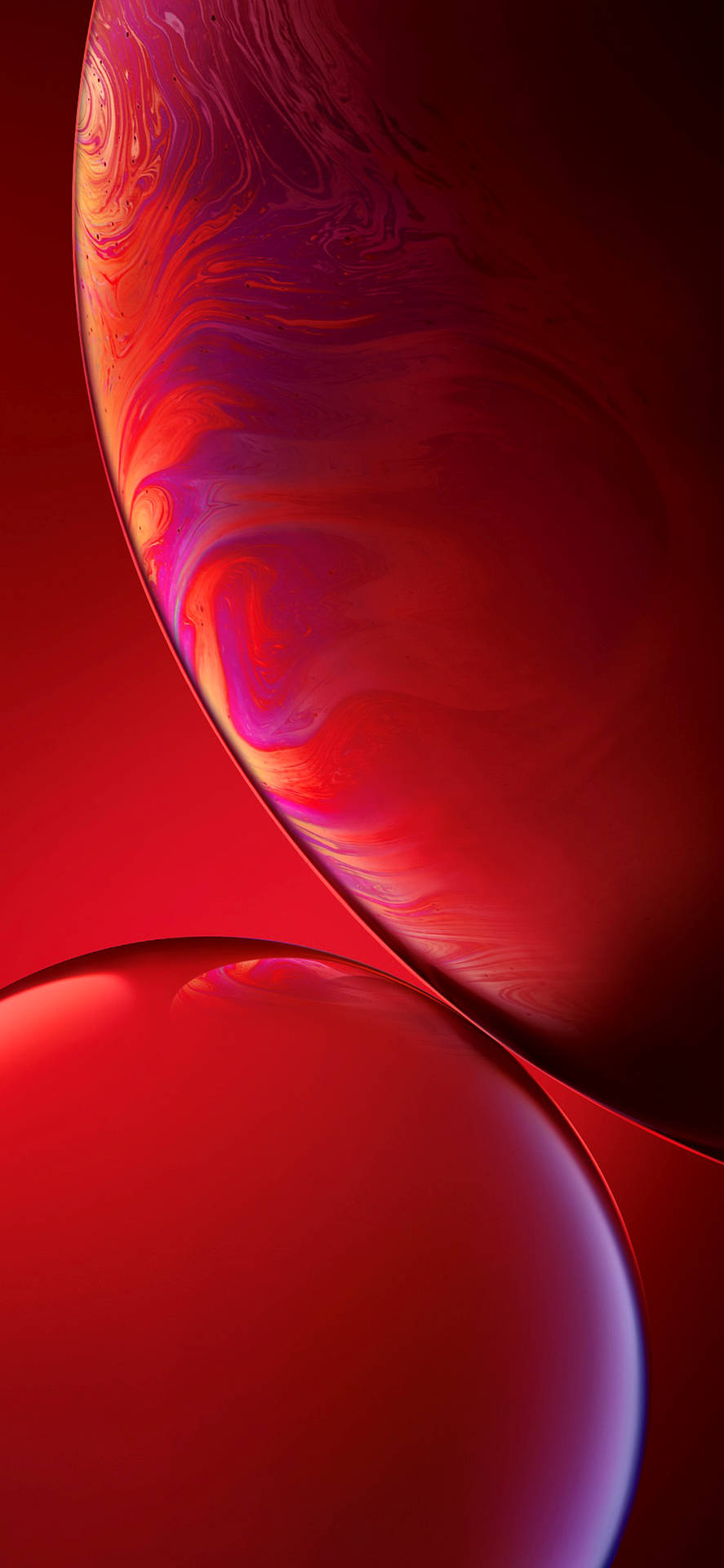 Aesthetic iPhone Xr 桌布 壁紙 — 兩個帶有旋轉紅、紫、橙漸層的光澤球體漂浮在深紅色背景上。