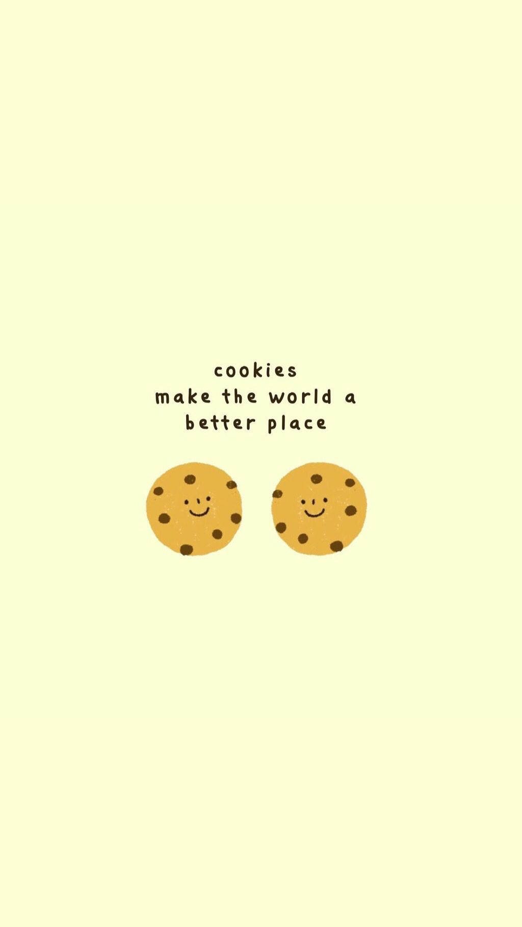 Cookie 桌布 壁紙 — 兩個微笑的卡通餅乾，帶有巧克力片，坐在文字「餅乾讓世界更美好」下方，背景為淡黃色。