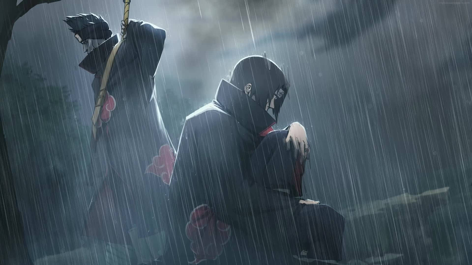 Itachi And Kisame 桌布 壁紙 — 兩個戴面具的動漫人物，身穿帶有紅色雲朵的黑色斗篷，在黑暗暴風雨的天空下，莊嚴地站在大雨中。