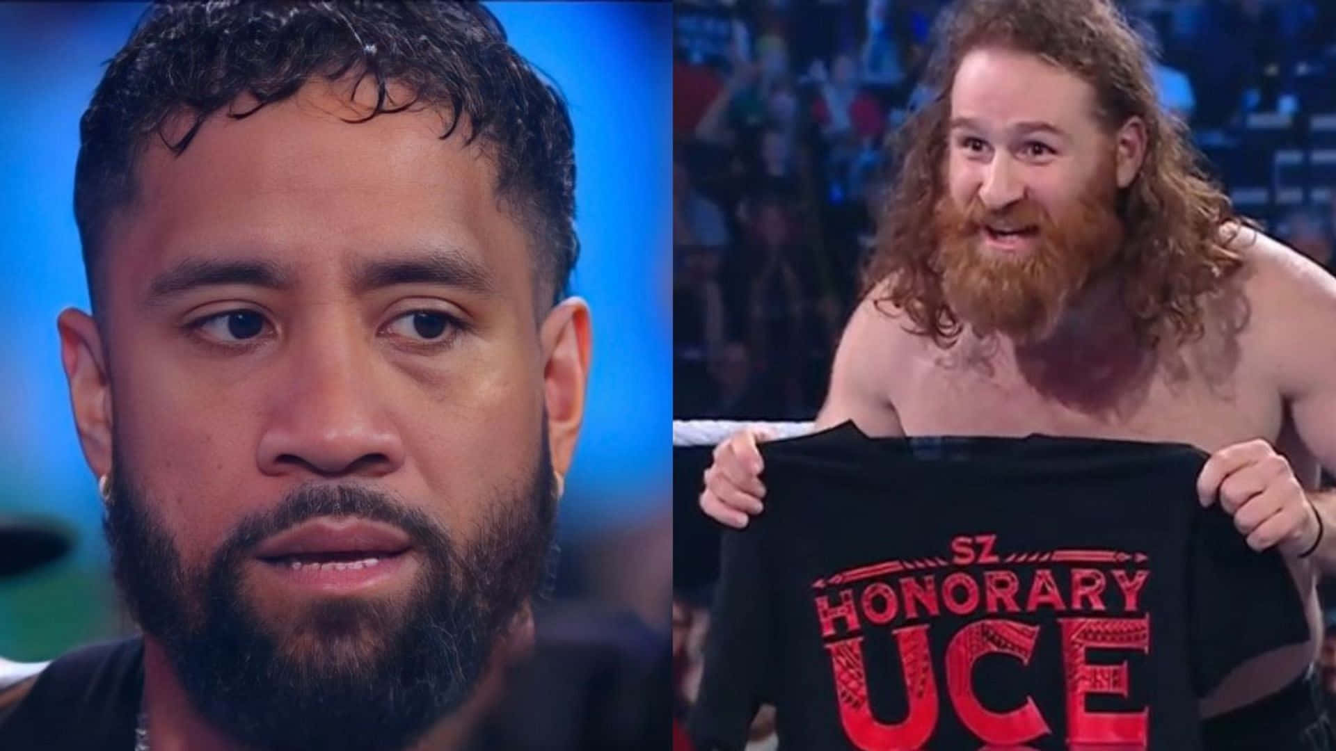 WWE 桌布 壁紙 — 兩個男人在摔角擂台上，其中一個拿著一件印有「HONORARY UCE」的黑色襯衫，另一個則以嚴肅的表情看著。