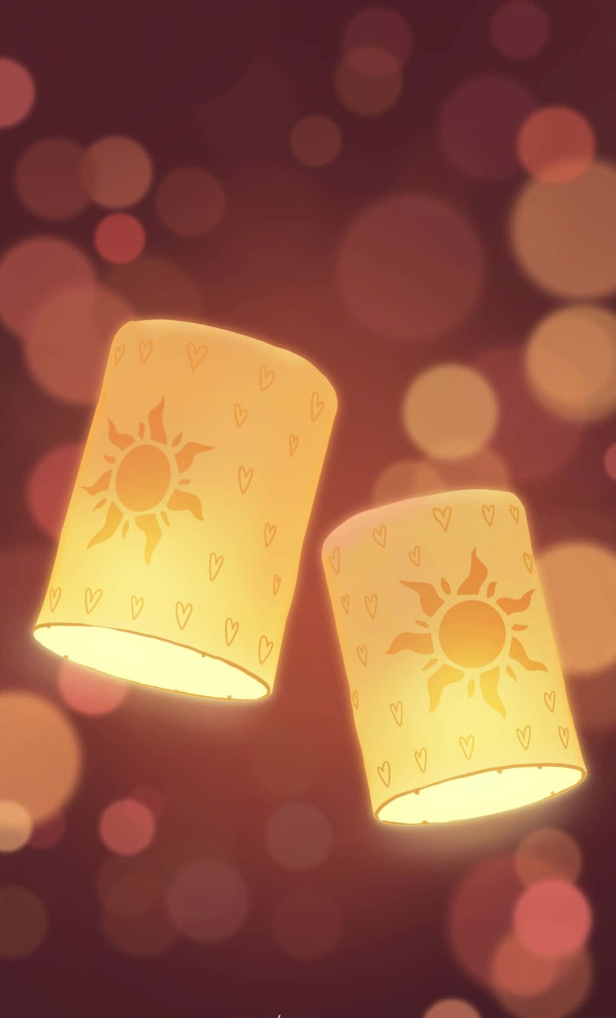 Disney Valentine 桌布 壁紙 — 兩個發光的燈籠，帶有太陽和心形鏤空圖案，漂浮在溫暖的散景背景上。