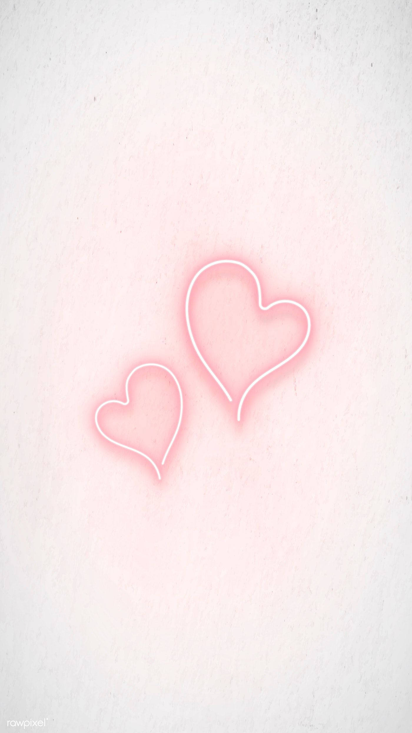 Pastel Pink Heart 桌布 壁紙 — 兩個發光的粉紅色霓虹心臟在帶有紋理的淡粉色牆壁上輕輕漂浮。