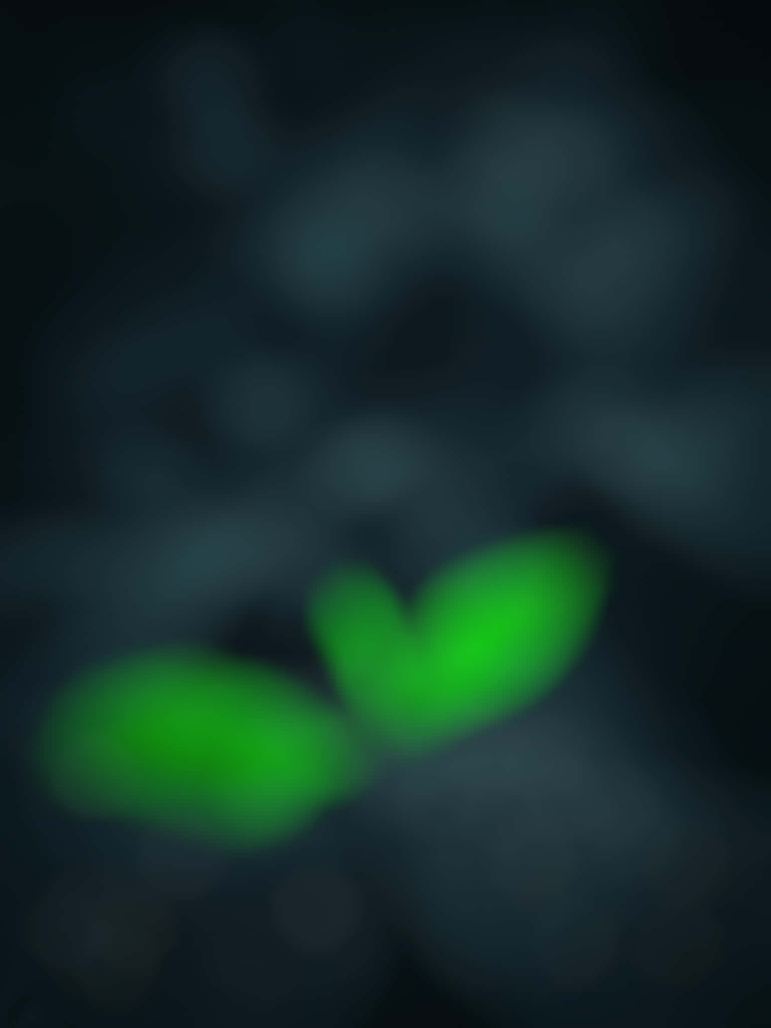 Black Blur 桌布 壁紙 — 兩個發光的綠色心形在深青色背景上柔和模糊。