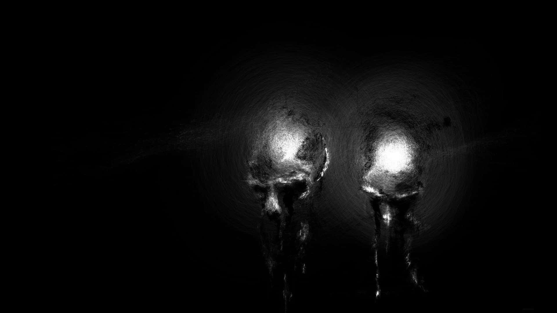 Dark Scary 桌布 壁紙 — 兩個發光的頭骨在黑暗中漂浮，從眼窩散發出詭異的光芒。