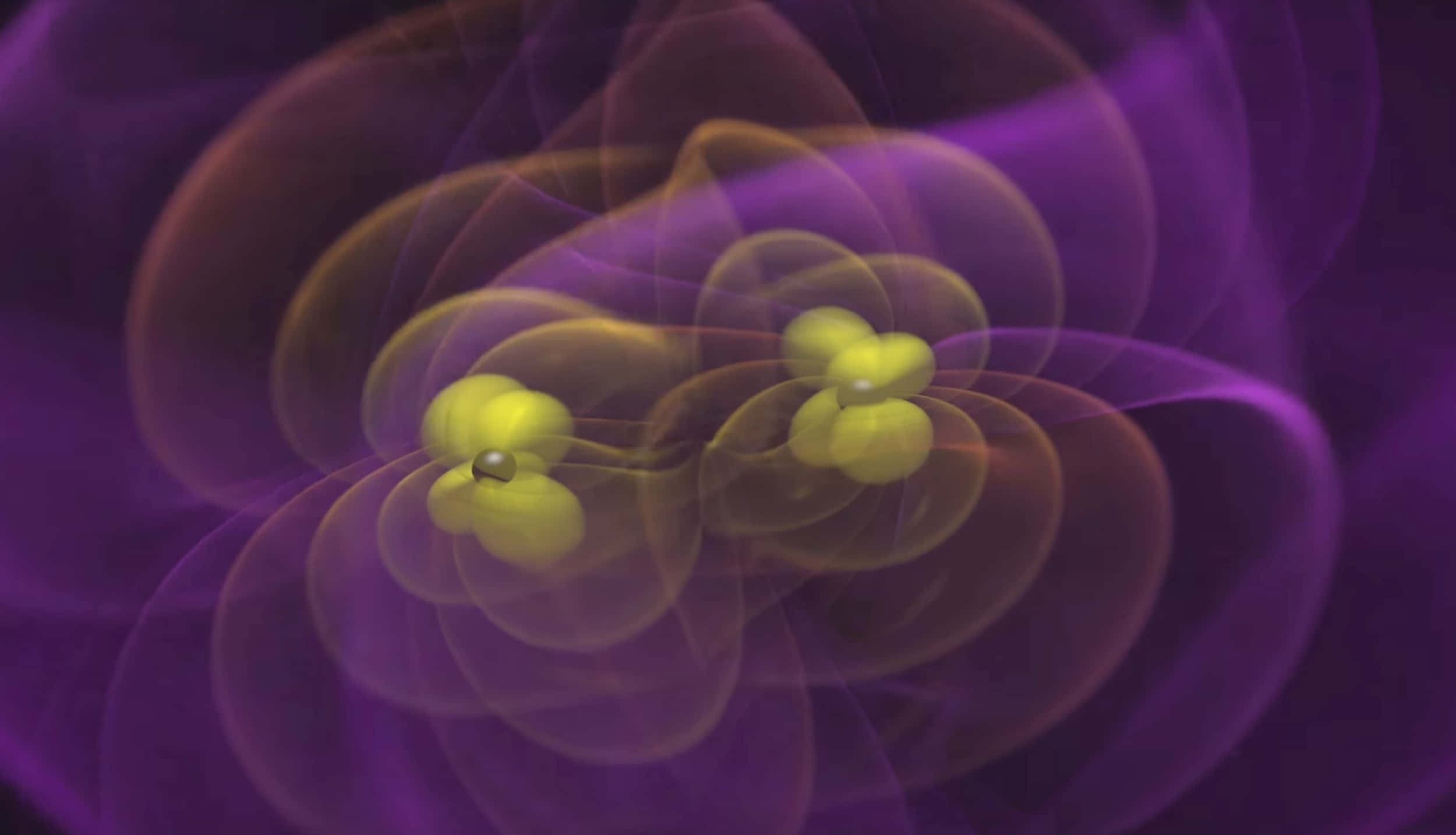 Gravitational Waves 桌布 壁紙 — 兩個發光的黃色原子核，被旋轉的半透明軌道包圍，背景為深紫色。