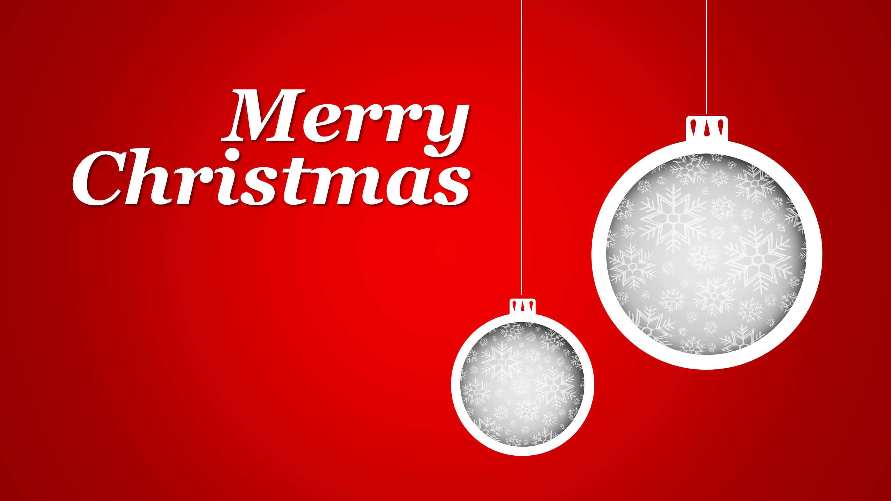 Christmas Powerpoint 桌布 壁紙 — 兩個白色雪花圖案的聖誕裝飾品懸掛在鮮紅色背景上，並帶有「聖誕快樂」文字。