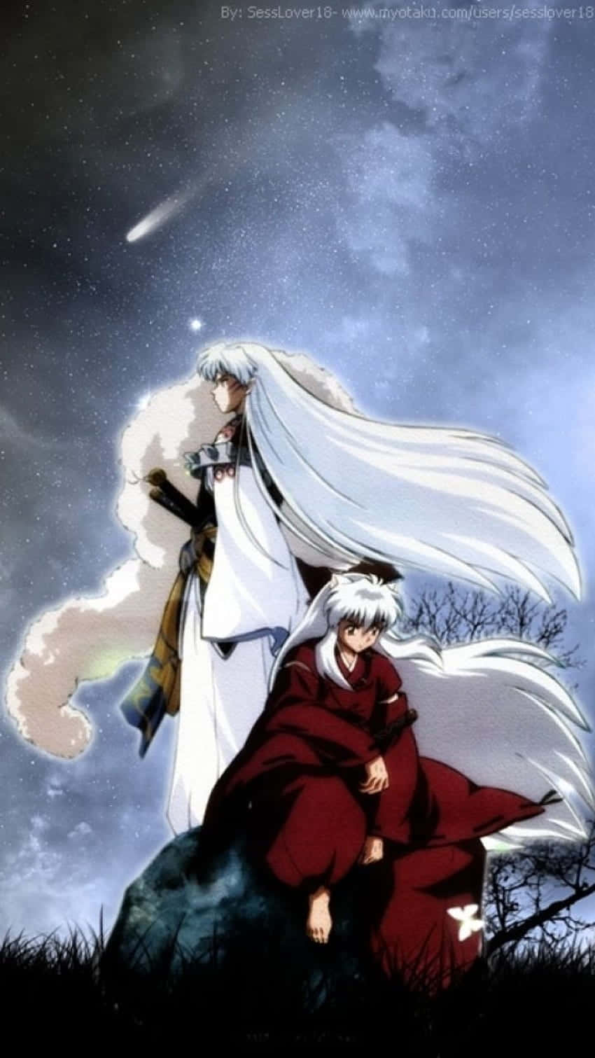 Sesshomaru 桌布 壁紙 — 兩個白髮動漫角色站在岩石山上，星空下有一顆流星。