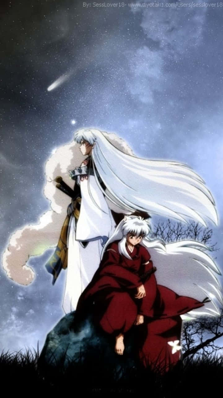 Inuyasha iPhone 桌布 壁紙 — 兩個白髮動漫角色站在岩石露頭上，在繁星點點的夜空下，一顆流星劃過頭頂。
