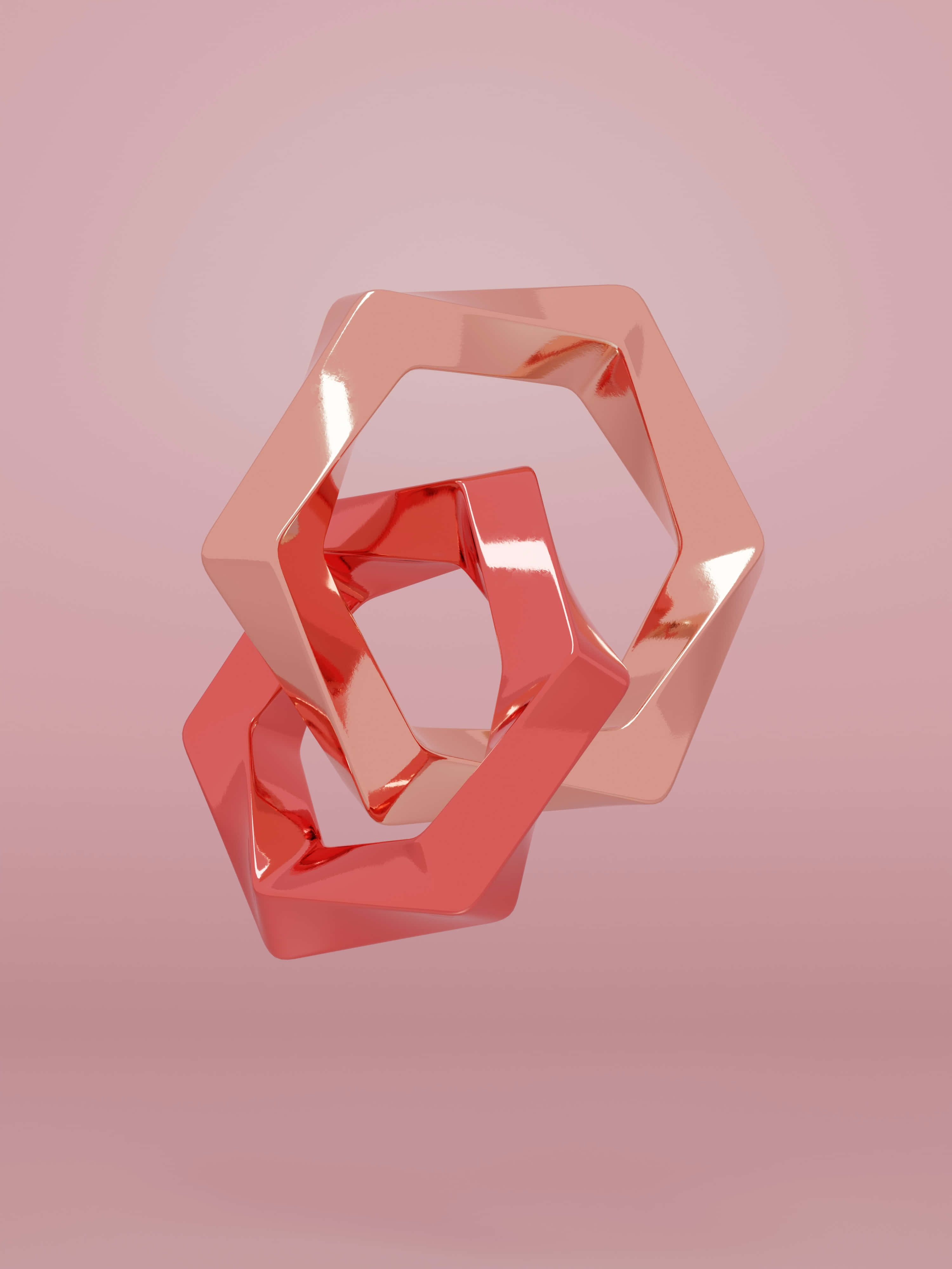 3D 桌布 壁紙 — 兩個相互鎖定的玫瑰金六角形戒指漂浮在柔和的粉紅色漸變背景上。