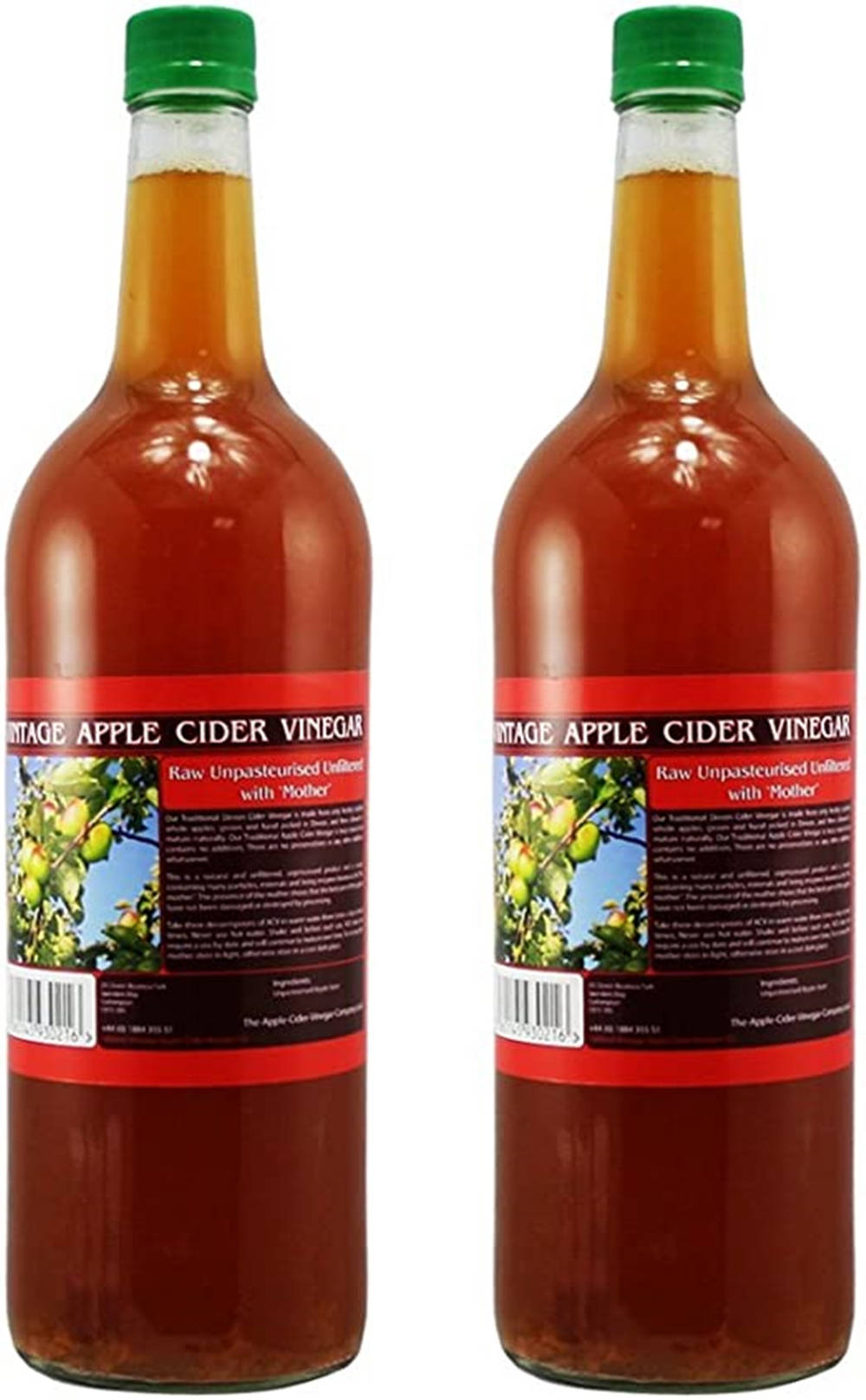 Drink 桌布 壁紙 — 兩個相同的玻璃瓶，裝有琥珀色的復古蘋果醋，帶有綠色蓋子和紅色標籤，上面有蘋果樹圖案。