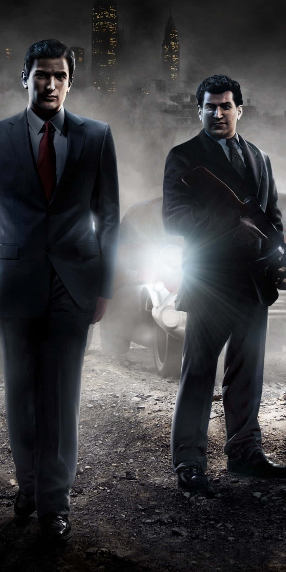 Mafia 桌布 壁紙 — 兩個穿西裝的男人站在煙霧瀰漫的城市夜晚，身後有一輛發光的汽車。