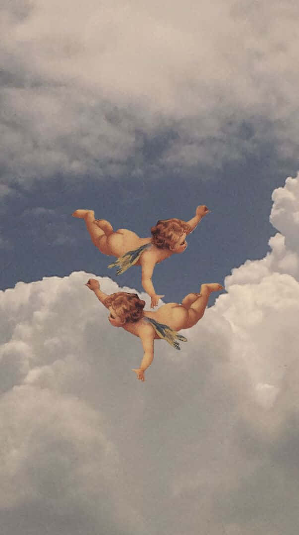 Angel Aesthetic Clouds 桌布 壁紙 — 兩個胖乎乎有翼的小天使在深藍色天空的柔軟雲朵中歡快地翻滾。