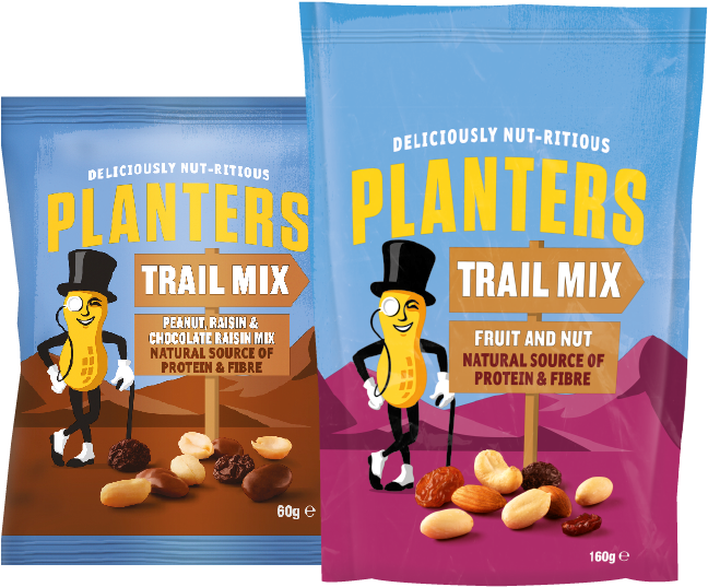 Snacks 桌布 壁紙 — 兩個色彩繽紛的Planters Trail Mix包裝袋，上面有一個卡通花生角色站在散落的堅果和葡萄乾旁邊，背景是山脈。
