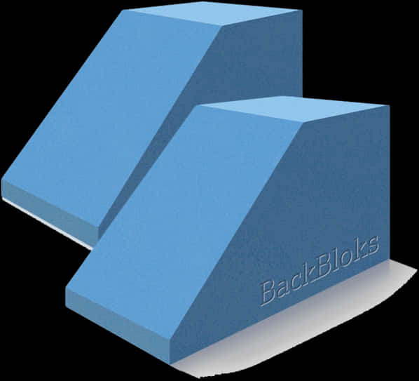 Pain 桌布 壁紙 — 兩個藍色楔形泡棉塊，其中一個帶有「BackBloks」文字，在黑色背景上孤立。