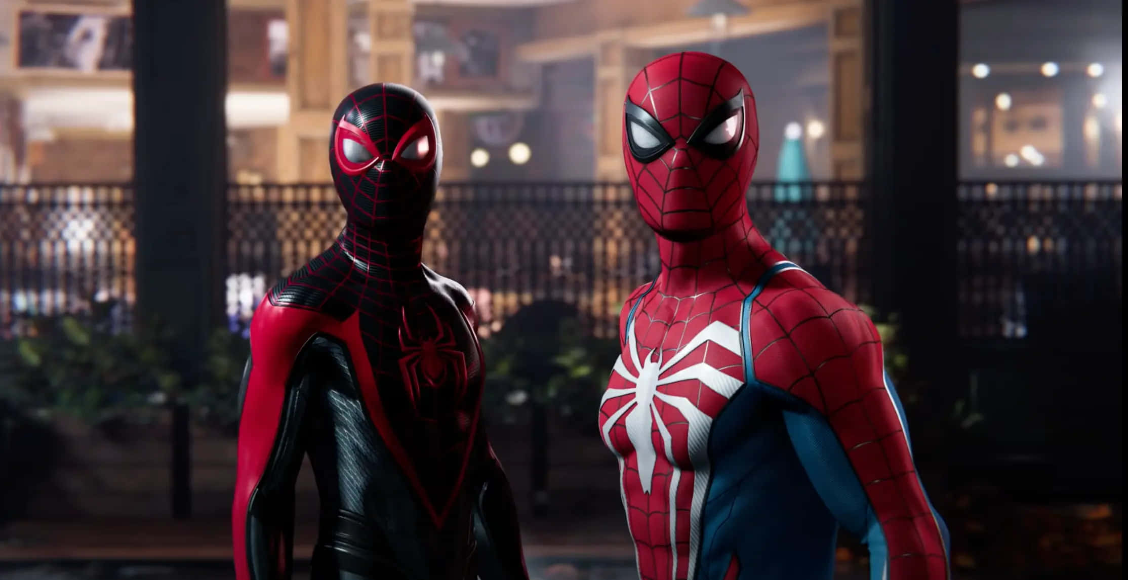 Superhero Video Games 桌布 壁紙 — 兩個蜘蛛人角色在夜晚昏暗的城市小巷中並肩站立，眼睛發光，服裝細節豐富。