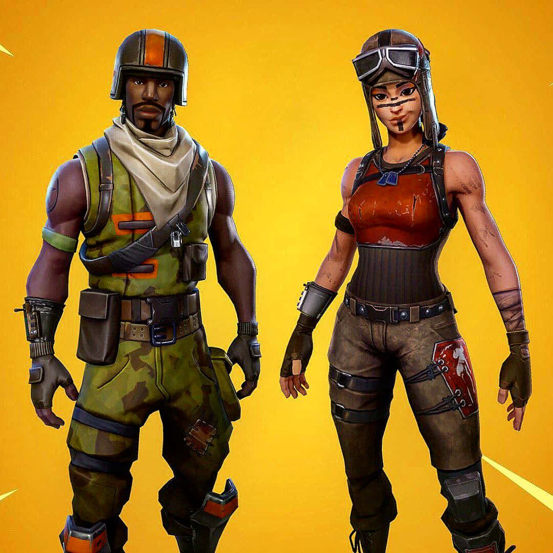 Aerial Assault Trooper 桌布 壁紙 — 兩個身穿戰鬥裝備的Fortnite角色自信地站在充滿活力的黃色背景前。