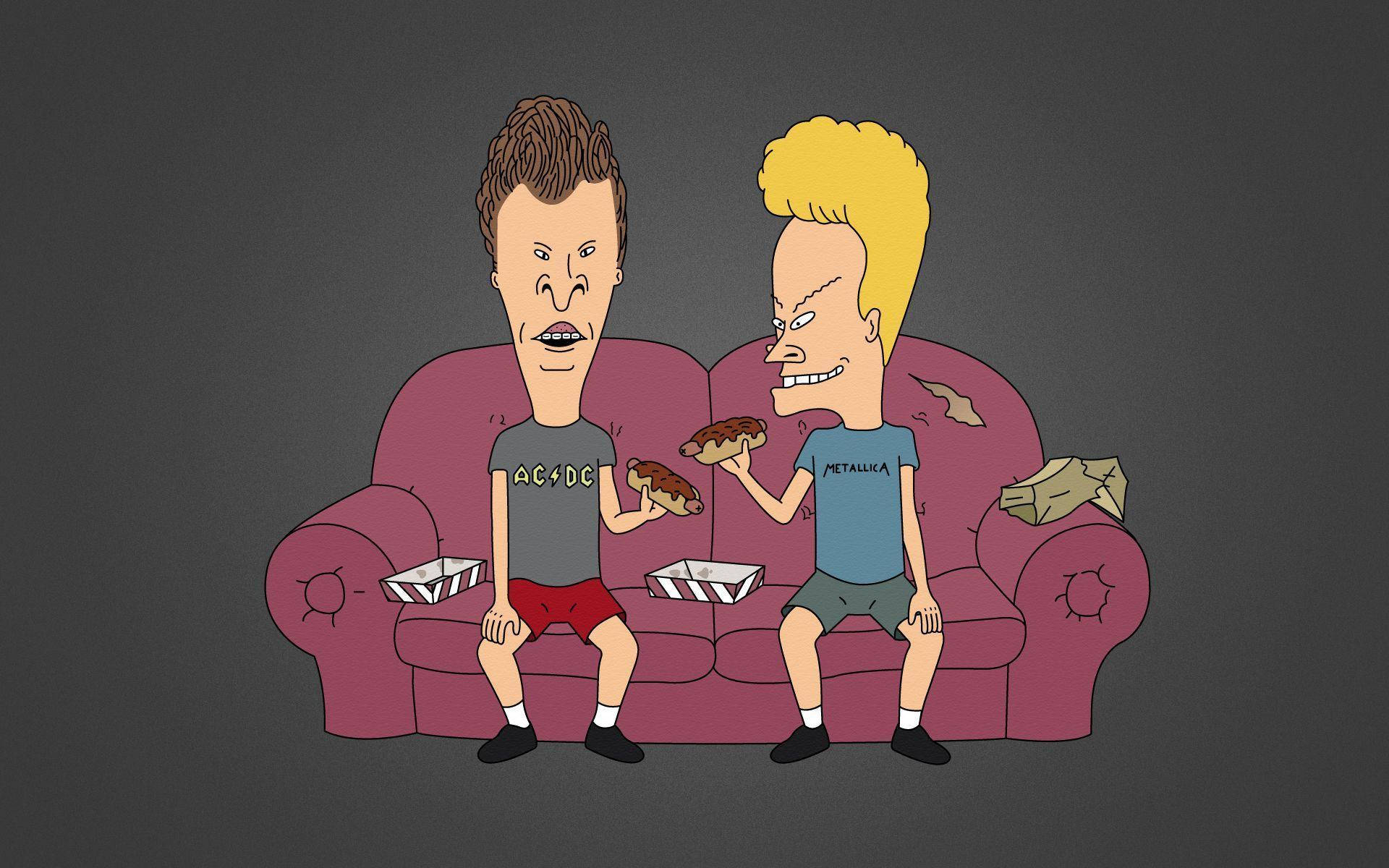Beavis 桌布 壁紙 — 兩個頭部誇張的卡通男人坐在一張破舊的紫色沙發上吃披薩，並拿著外賣盒。