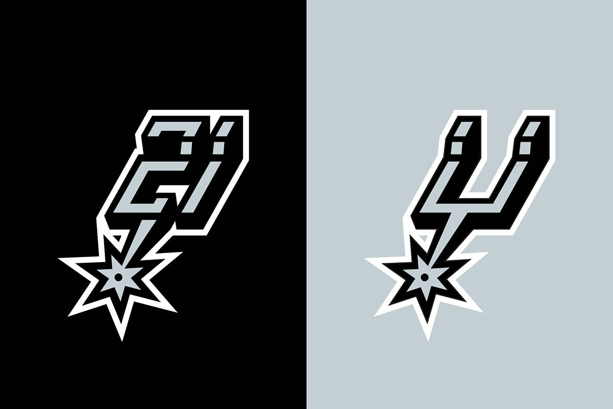 Spurs 桌布 壁紙 — 兩個風格化的Spurs標誌垂直分割在黑色和淺灰色背景上，帶有銳利的白色輪廓和星星點綴。
