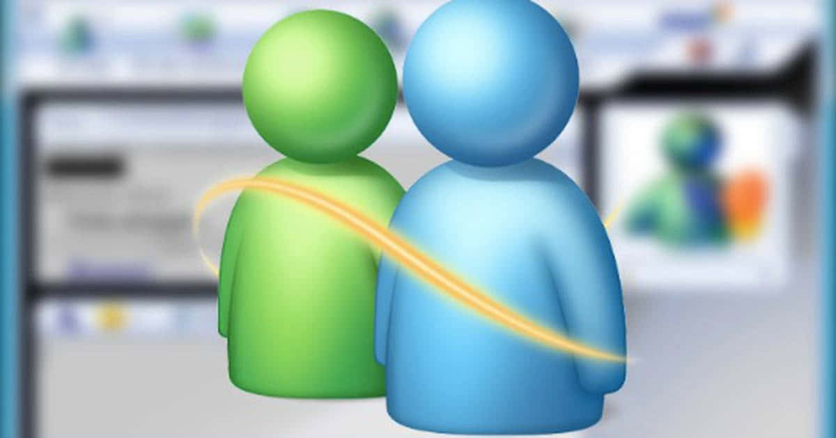 msn 桌布 壁紙 — 兩個風格化的綠色和藍色人形並排站立，它們之間有一道發光的黃色弧線，背景是模糊的電腦螢幕。