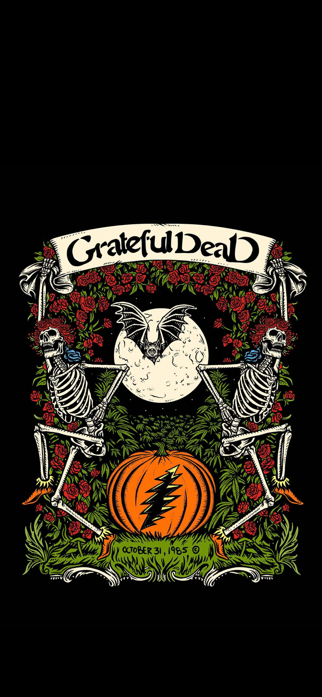 Grateful Dead iPhone 桌布 壁紙 — 兩個骷髏頭夾著一個月亮，旁邊有一隻蝙蝠和一個帶有Grateful Dead閃電標誌的南瓜。