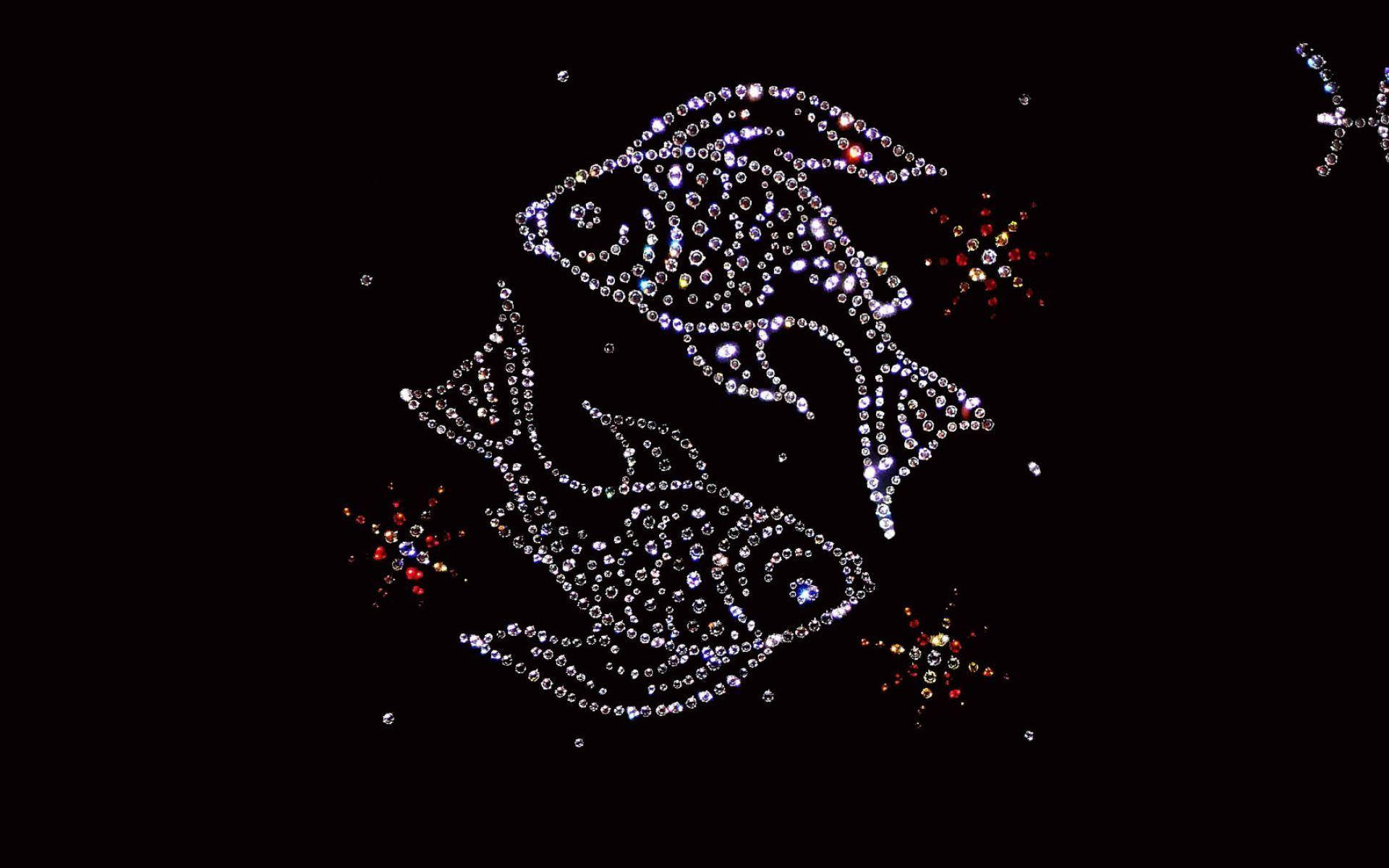 雙魚座 桌布 壁紙 — 兩個魚星座在黑色背景上閃爍著閃亮的水晶，周圍環繞著色彩繽紛的星爆。