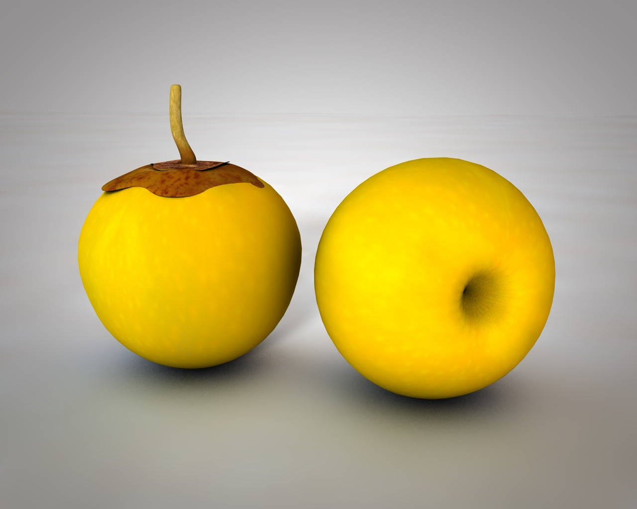 Fruits 桌布 壁紙 — 兩個鮮黃色的蘋果，一個帶有莖和葉，另一個顯示莖腔，背景為中性灰色。