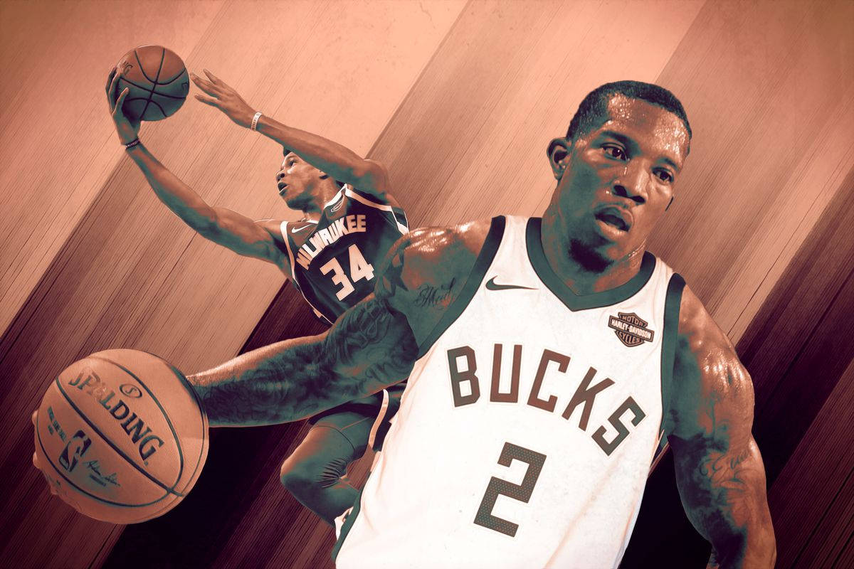 eric bledsoe 桌布 壁紙 — 兩名密爾瓦基公鹿籃球運動員在木地板上比賽，帶有戲劇性燈光和動態模糊效果。