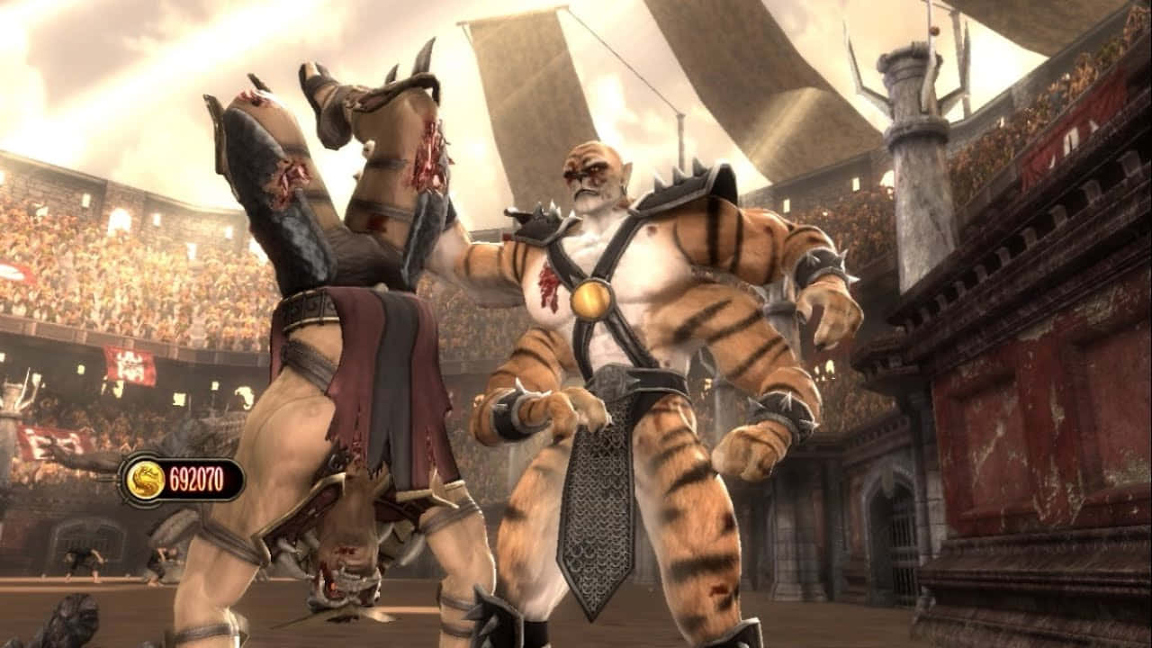 Mortal Kombat Kintaro 桌布 壁紙 — 兩名擁有老虎條紋的肌肉發達戰士在多雲的天空下，於擁擠的古代競技場中打鬥。