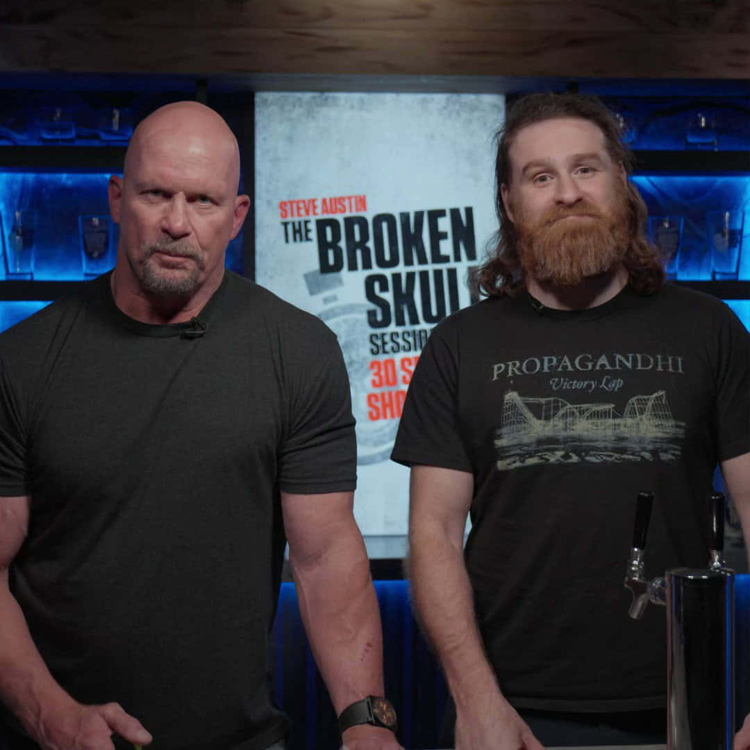 sami zayn 桌布 壁紙 — 兩名男子站在燈光昏暗的酒吧中，背景有藍色霓虹燈和「Broken Skull Sessions」佈景。