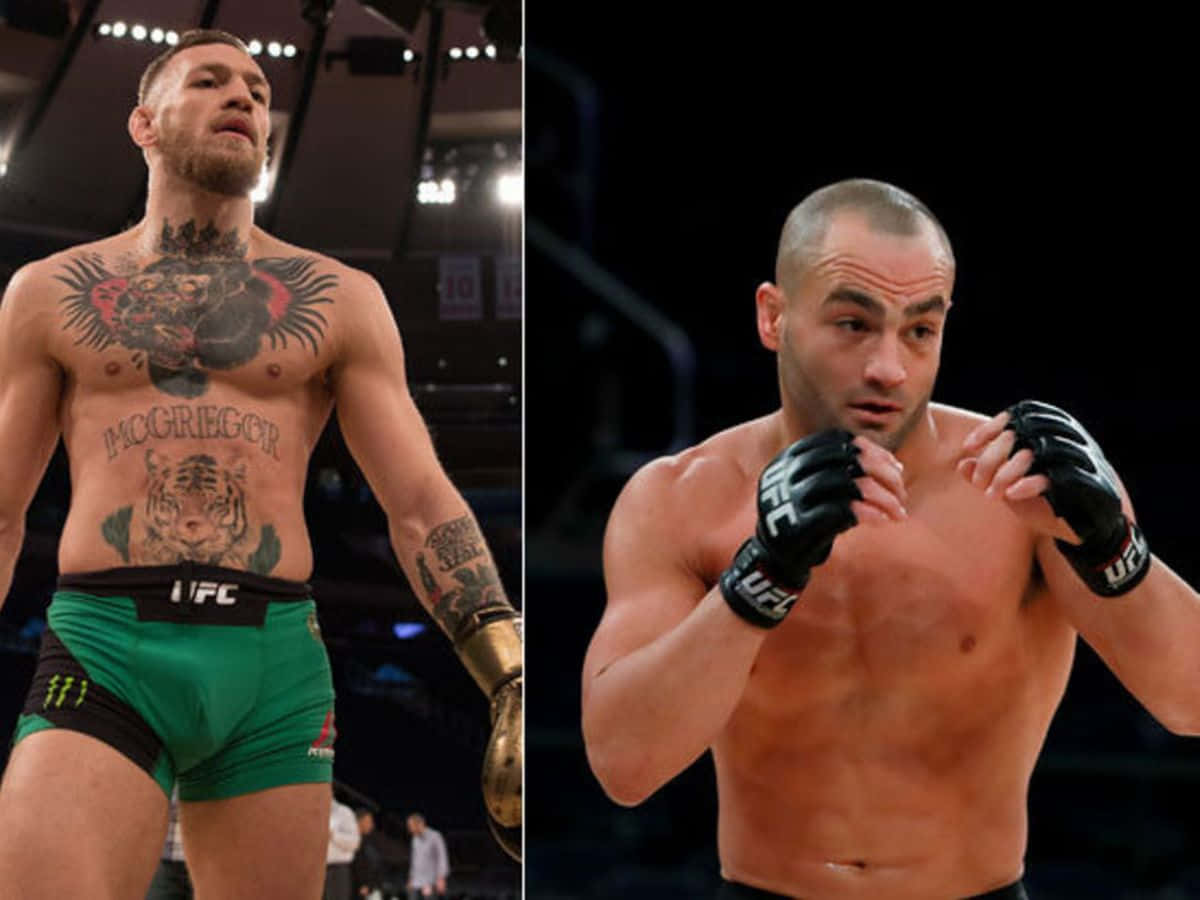 MMA 桌布 壁紙 — 兩名肌肉發達的UFC拳手在場館燈光下以戰鬥姿勢站立，一人有刺青，另一人專注並準備就緒。