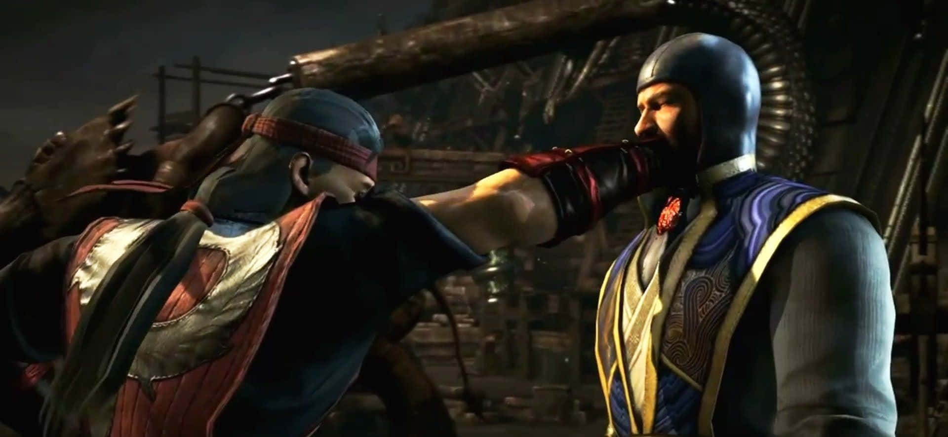 Mortal Kombat Fatality 桌布 壁紙 — 兩名裝甲戰士在一個充滿鋼樑和昏暗燈光的工業競技場中激烈交鋒。
