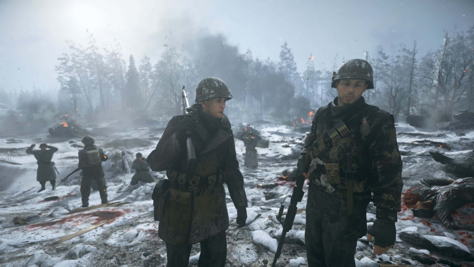 Call Of Duty Battles 桌布 壁紙 — 兩名身穿冬季裝備的士兵站在一個佈滿屍體和燃燒殘骸的雪地戰場上，天空灰濛濛的，煙霧瀰漫。