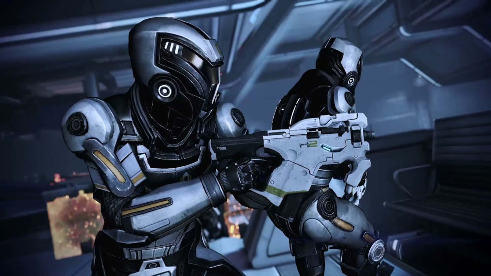 Mass Effect Cerberus 桌布 壁紙 — 兩名身穿未來戰鬥裝備的裝甲士兵在光線昏暗的太空船走廊中瞄準重型武器。