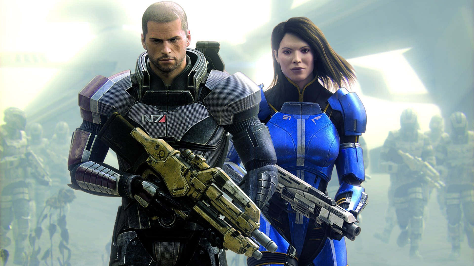 Mass Effect Trilogy 桌布 壁紙 — 兩名身穿未來戰鬥裝備的裝甲士兵在朦朧的科幻戰場上手持武器準備就緒。