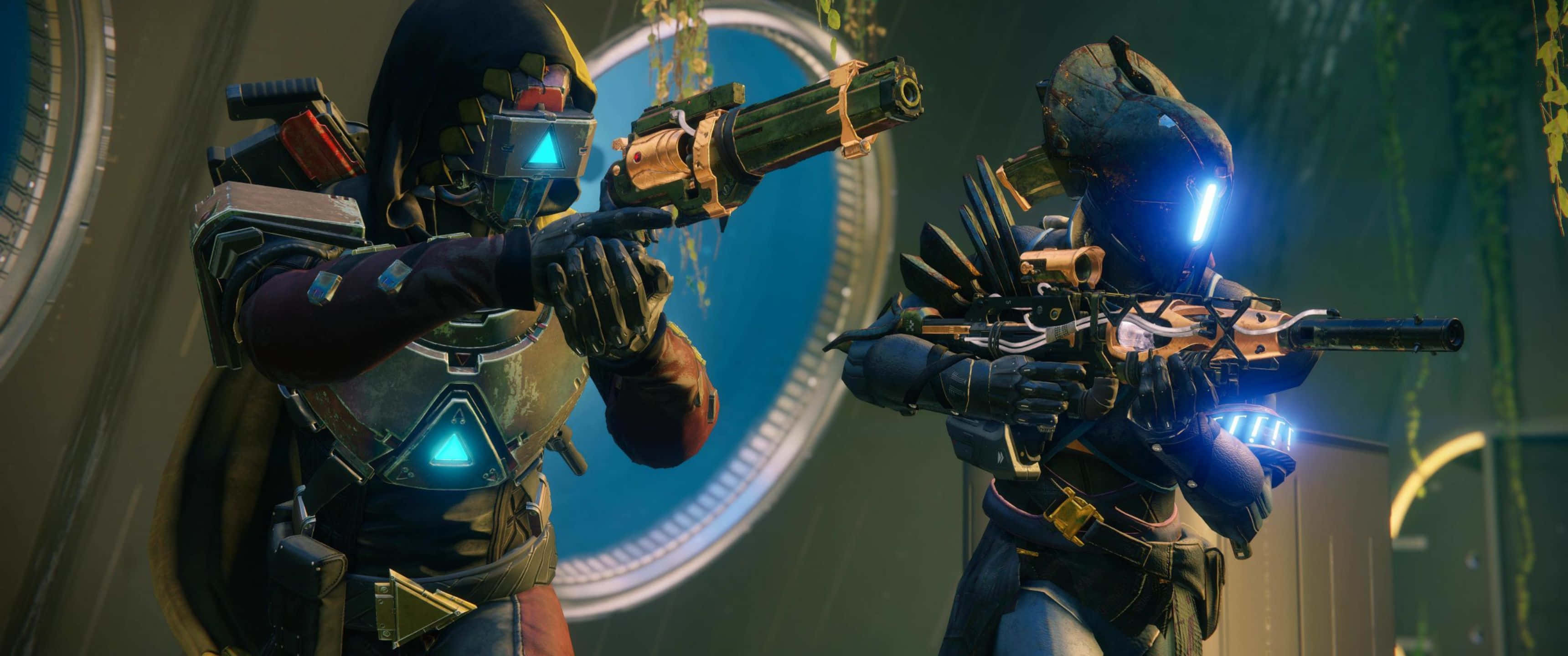 Destiny 2 桌布 壁紙 — 兩名身穿未來裝備的裝甲太空士兵在發光的外星走廊中瞄準武器。