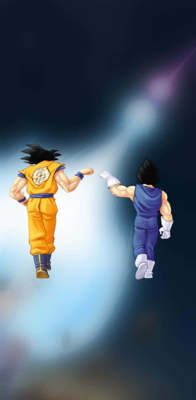 桌布 壁紙 — 兩名身穿橙色和藍色道服的動漫戰士在宇宙空間中飛行，身後留下發光的能量痕跡。