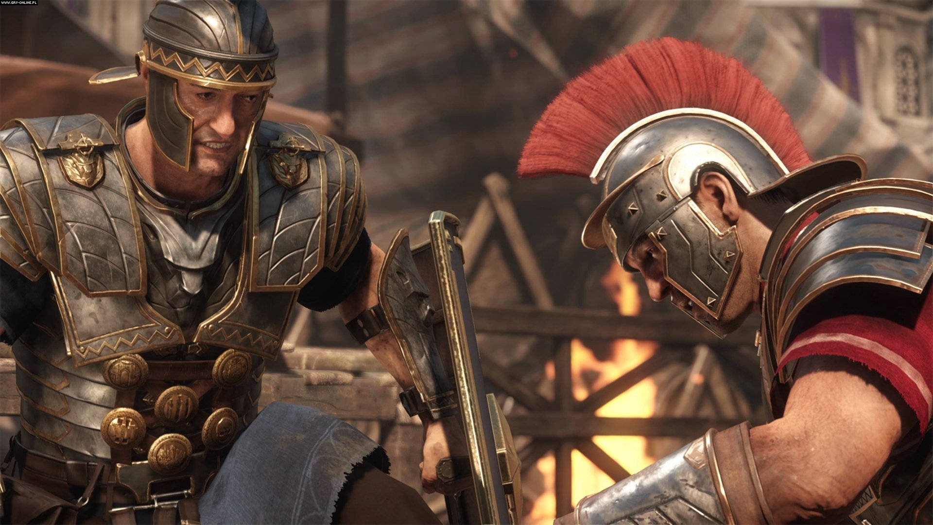 rome 2 桌布 壁紙 — 兩名身穿精細盔甲的羅馬士兵在烈火戰場上緊張對峙。