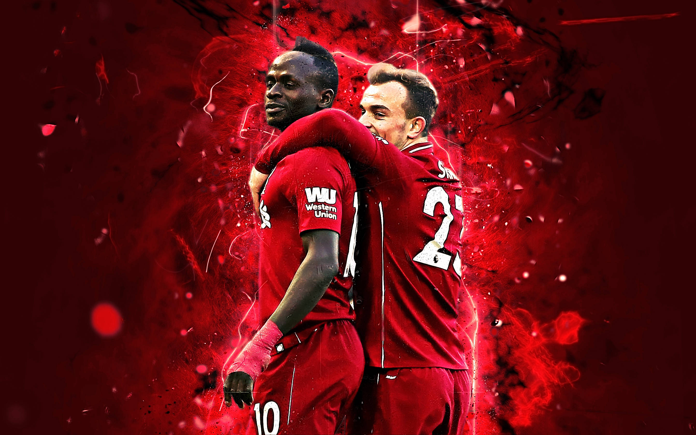Liverpool Fc 桌布 壁紙 — 兩名身穿紅色球衣的足球運動員在動態紅色潑濺背景和電能效果下擁抱。