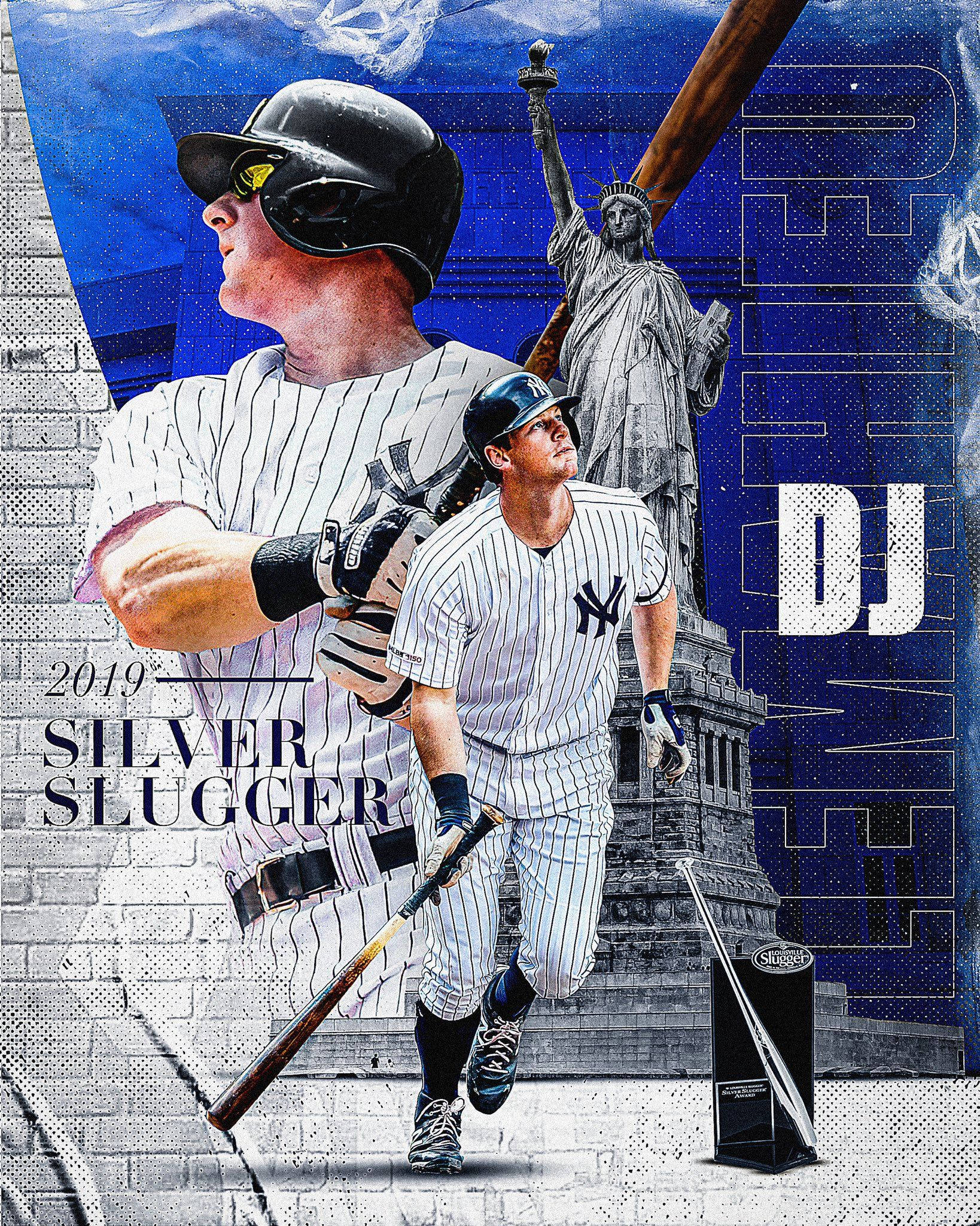 Dj Lemahieu 桌布 壁紙 — 兩名身穿細條紋球衣的棒球運動員，在 gritty 的城市背景下，手持球棒向前邁進，背景有自由女神像和「2019 SILVER SLUGGER」字樣。