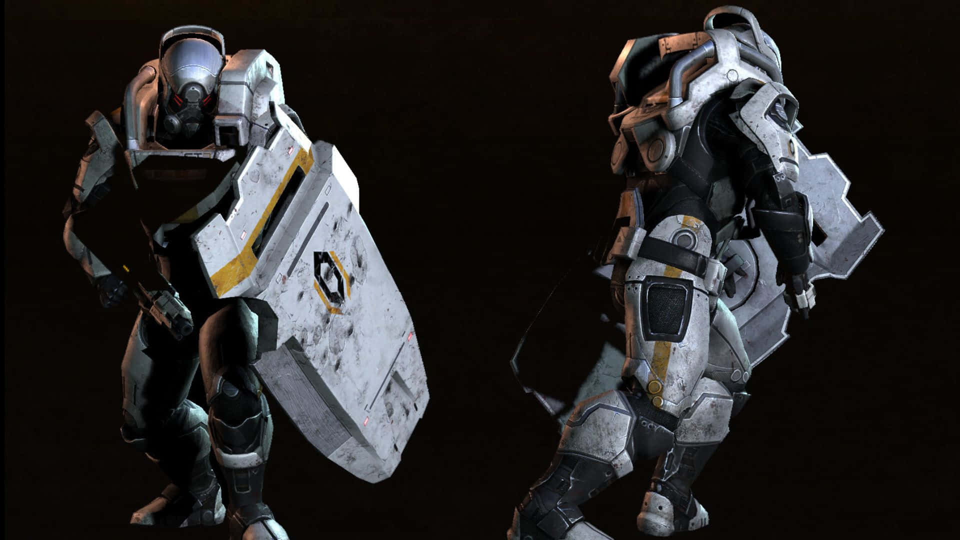 Mass Effect Cerberus 桌布 壁紙 — 兩名身穿銀黑色裝備的重裝未來戰士在黑暗背景下擺好姿勢。