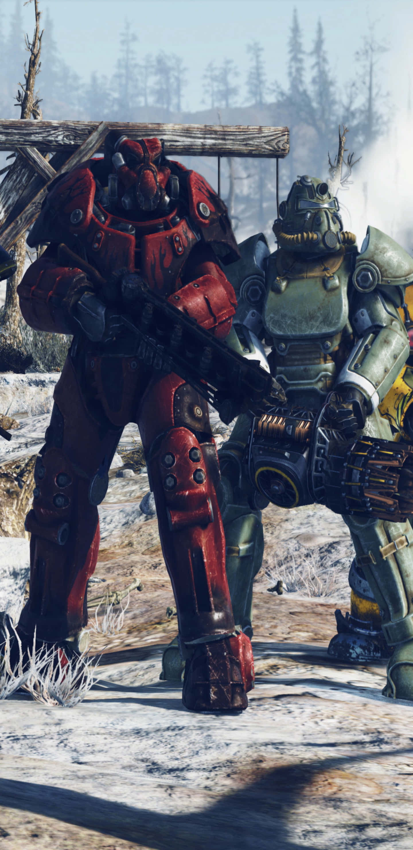 Pixel 3xl Fallout 76 桌布 壁紙 — 兩名重裝動力裝甲士兵站在雪地荒原中，背景有松樹和木結構。