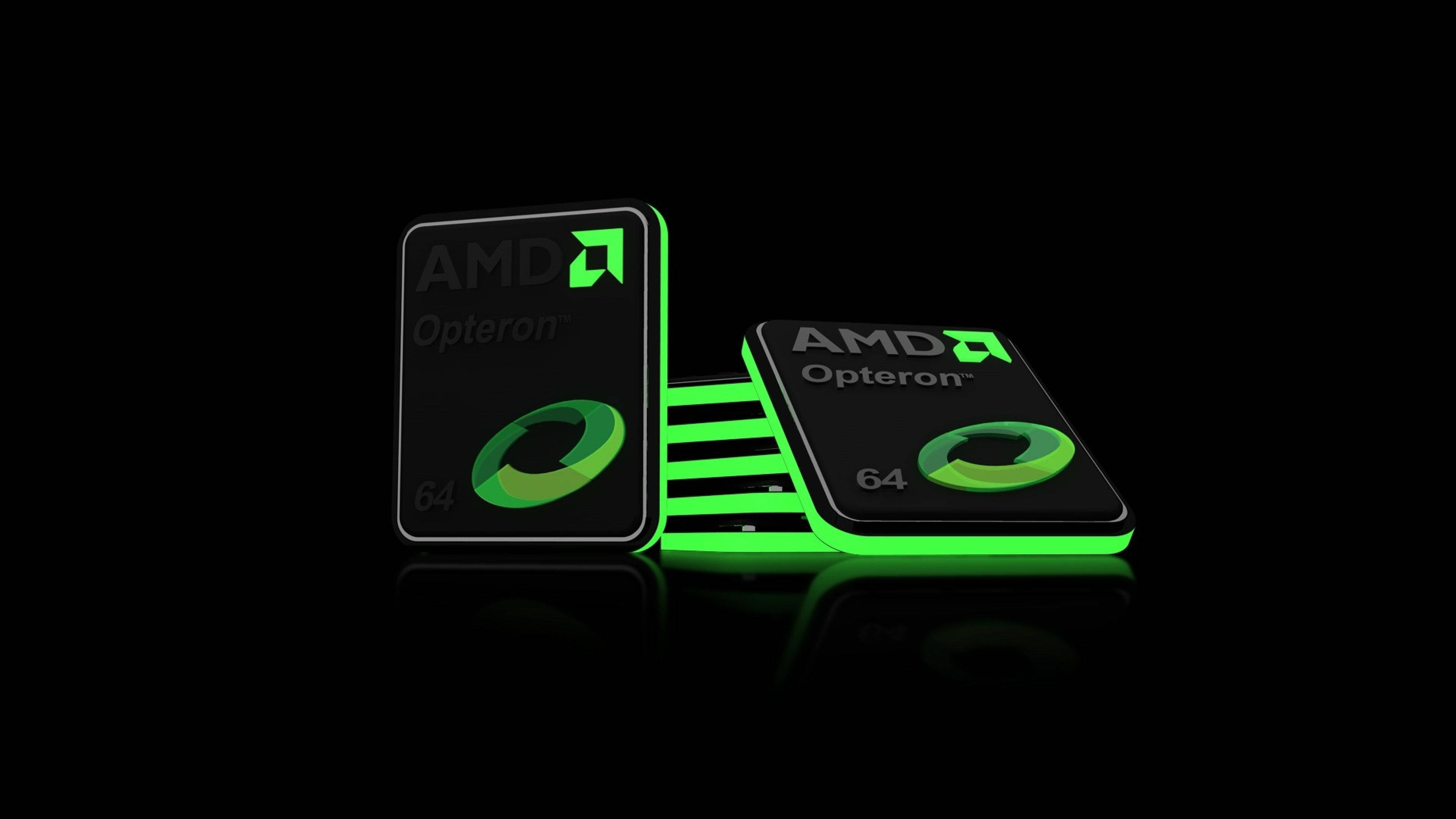 AMD 桌布 壁紙 — 兩塊發光的綠色 AMD Opteron 64 伺服器處理器豎立在反射黑色表面上，帶有戲劇性的燈光效果。