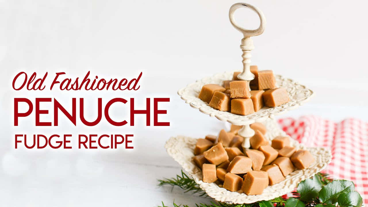 Penuche Fudge 桌布 壁紙 — 兩層白色支架上放著金棕色彭努奇軟糖方塊，旁邊有紅色格紋布和綠色植物。