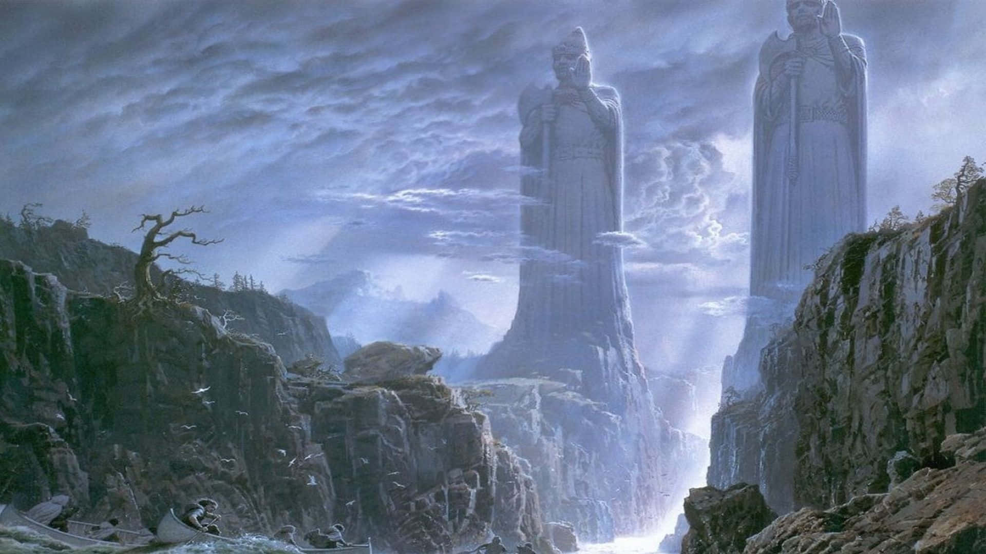 Lotr 桌布 壁紙 — 兩座巨大的石像從霧氣籠罩的峽谷中升起，在暴風雨的天空下，伴隨著光禿的樹木和遠山。