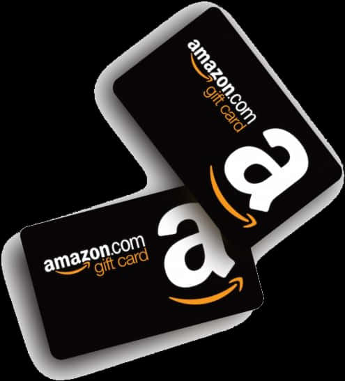 亞馬遜 桌布 壁紙 — 兩張黑色Amazon禮品卡，帶有白色和橙色標誌，傾斜放置在純黑色背景上。