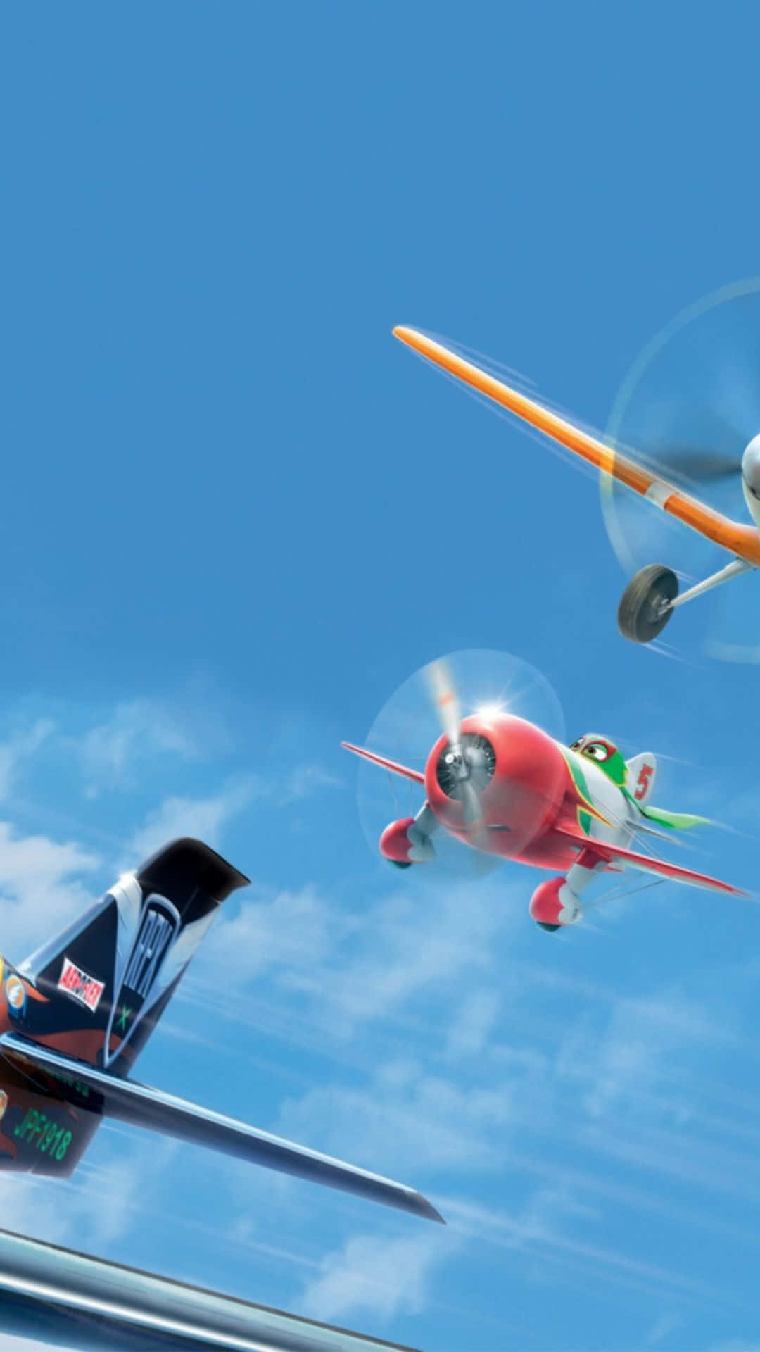 Android Small Planes 桌布 壁紙 — 兩架色彩繽紛的卡通飛機在明亮藍天中競賽，伴隨著縷縷白雲。