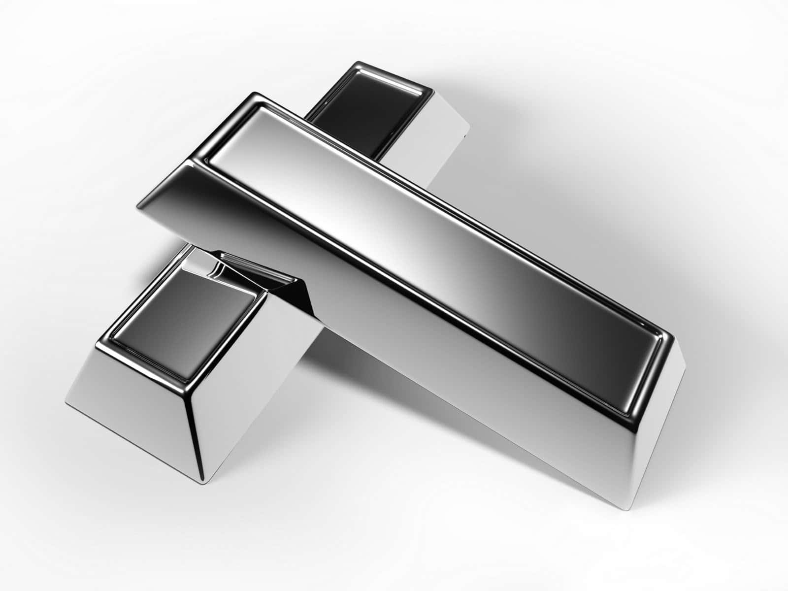 Silver 桌布 壁紙 — 兩條光滑的銀色條以一定角度相交在一個反射柔和光線的純白色表面上。