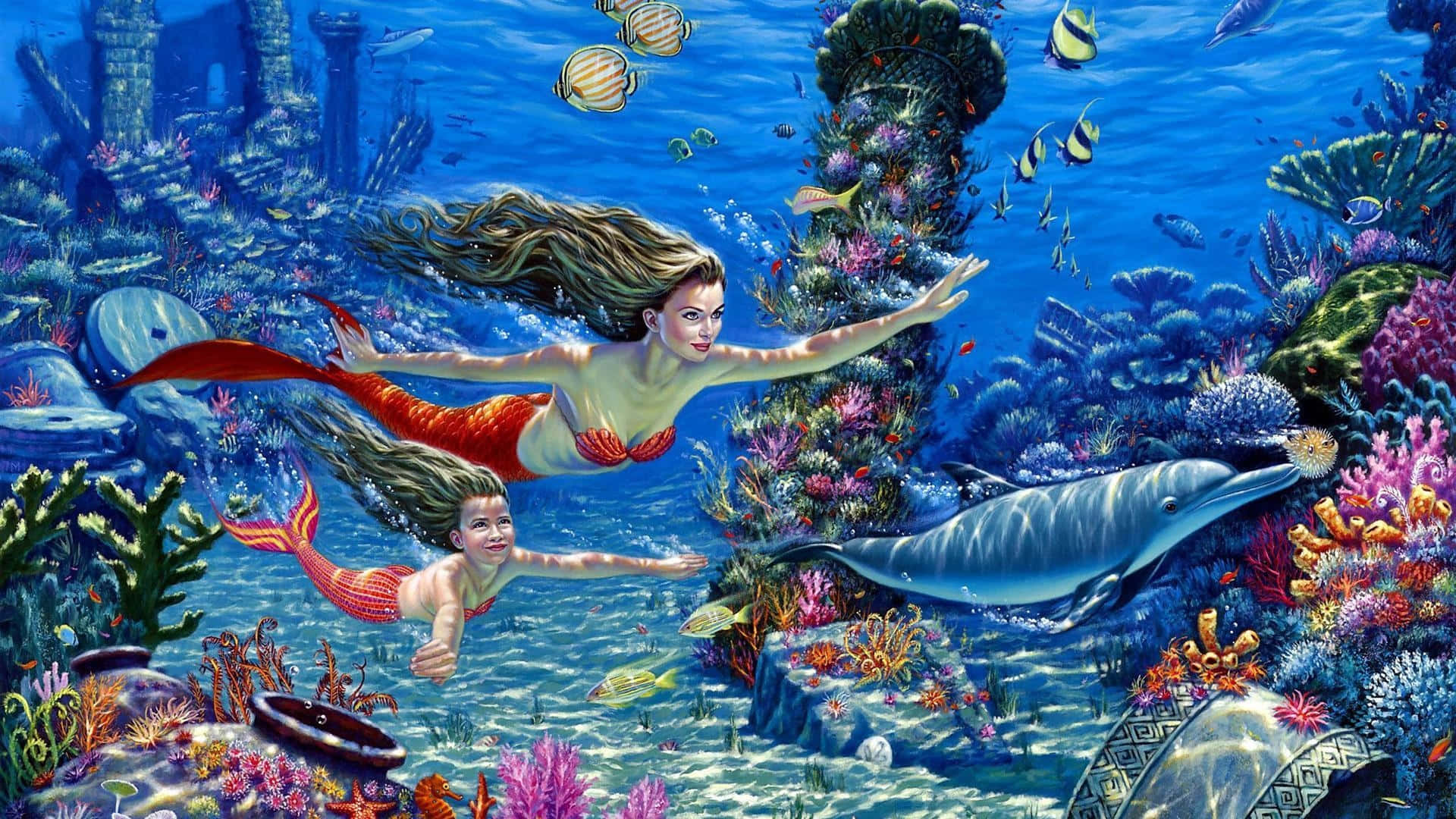 美人魚 桌布 壁紙 — 兩條美人魚在充滿活力的珊瑚礁中滑行，海豚和熱帶魚在陽光普照的廢墟附近游動。